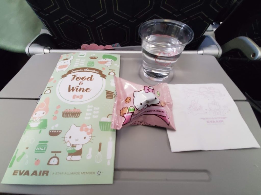 eva air economy class hello kitty menu snack napkin drink