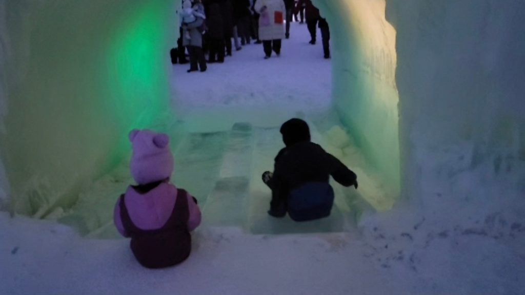 small ice slide at ice castles in Lake Geveva Wisconsin